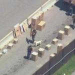 Boxes were checked by a bomb-sniffing dog at Hanscom Air Force Base.