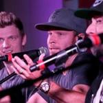 Nick Carter, Brian Littrell, and AJ McLean answered questions during a short set for Mix 104.1 listeners at the Revere Hotel on Friday. 