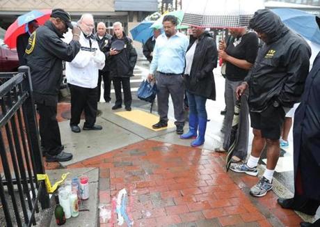 Father Jack Ahern from St. Patrick?s of Roxbury led a prayer Friday at the site in Dudley Square of the stabbing death of 18-year-old Anthony Woodbridge.
