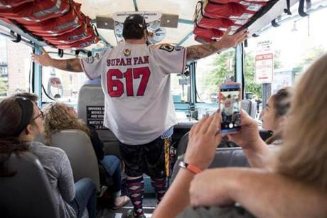 Duck boat tour guide Shawn-Paul Filtranti showed off his nickname, Supah Fan, embroidered on his uniform.
