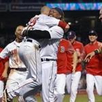 Boston, MA: June 12, 2017: The Red Sox Dustin Pedroia is lifted by teammate Hanley Ramirez after his game winning hit in the bottom of the 11th inning. The Boston Red Sox hosted the Philadelphia Phillies in a regular season MLB inter league baseball game at Fenway Park. Globe Staff Photo/ Jim Davis)
