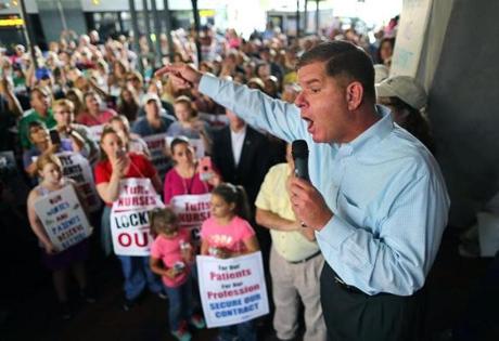 Boston-07/15/2017-Mayor Marty Walsh stresses a point as he speaks to a rally outside Tufts Medical Center. Hundreds of nurses who went on strike and are locked out of Tufts Medical Center joined in a rally with supporters to listen to Boston Mayor Marty Walsh, and Congressmen Stephen Lynch and Mike Cupuano as they spoke in front of the hospital. John Tlumacki/Globe Staff(metro)
