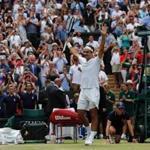 Switzerland's Roger Federer celebrates after winning against Croatia's Marin Cilic during their men's singles final match on the last day of the 2017 Wimbledon Championships at The All England Lawn Tennis Club in Wimbledon, southwest London, on July 16, 2017. Roger Federer won 6-3, 6-1, 6-4. / AFP PHOTO / Adrian DENNIS / RESTRICTED TO EDITORIAL USEADRIAN DENNIS/AFP/Getty Images