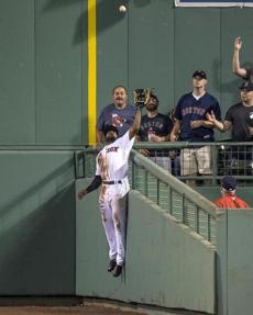 Red Sox pitcher David Price smiled after Bradley?s catch.
