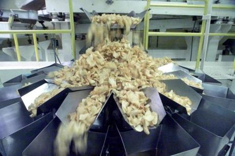 Cape Cod Potato Chips are weighed inside the Hyannis facility. 
