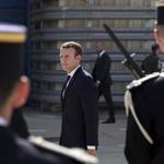 French President Emmanuel Macron reviews a military honour guard during a visit to the French air force base BA 125 in Istres, southeastern France, on July 20.