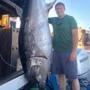 N.H. Trooper Nick Cyr with his 646-pound tuna. 