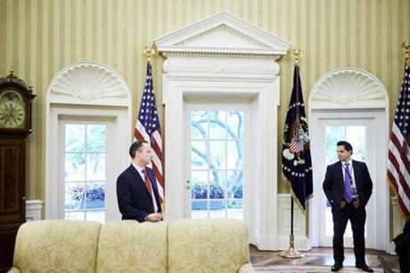 White House chief of staff Reince Priebus, left, and communications director Anthony Scaramucci, right, listened as President Donald Trump spoke with reporters during an Wall Street Journal interview.
