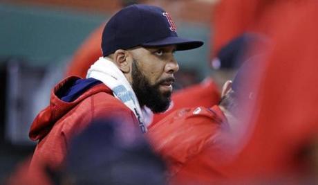 Boston Red Sox starting pitcher David Price sits in the dugout in the seventh inning during a baseball game against the Kansas City Royals at Fenway Park, Friday, July 28, 2017, in Boston. The Red Sox announced that Price was added to the 10-day disabled list prior to the game. (AP Photo/Charles Krupa)

