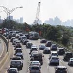 Boston, MA - 8/1/2017 - Traffic backs up along the Massachusetts Turnpike in the Allston neighborhood of Boston, MA, August 1, 2017. Interstate 90 reduces to two lanes of traffic each way through parts of Boston while workers rebuild the Commonwealth Avenue Bridge. (Keith Bedford/Globe Staff)