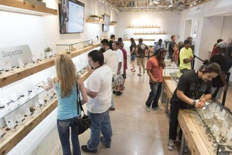 Customers shop at The Source cannabis dispensary in Las Vegas, Nev. on July 28, 2017. 
