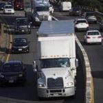 Traffic was heavy Tuesday on the Massachusetts Turnpike, in the area of the Commonwealth Avenue bridge and the accompanying lane reductions.