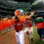 Boston, MA - 8/04/2017 - (11th inning) Boston Red Sox first baseman Mitch Moreland (18) received the ice bucket celebratory dunking after his game winning walkoff home run won it in the bottom of the eleventh inning. The Boston Red Sox host the Chicago White Sox at Fenway Park. - (Barry Chin/Globe Staff), Section: Sports, Reporter: Peter Abraham, Topic: 05Red Sox-White Sox, LOID: 8.3.3317095931.