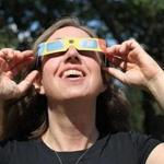 Kathy Reeves, an astrophysicist in Cambridge, has her eclipse glasses ready to go.