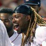 Boston, MA: July 18, 2017: Red Sox 1B Hanley Ramirez (second from right) won the game for Boston with a bottom of the 15th inning walk off solo home run, that brought his temmates to the plate to greet him. The Boston Red Sox hosted the Toronto Blue Jays in a regular season MLB baseball game at Fenway Park. (Jim Davis/Globe Staff)