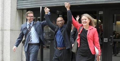 Frederick Clay walked out of the Suffolk Superior Courthouse a free man, after 38 years in prison. He is flanked by defense attorneys Jeffrey Harris and Lisa Kavanaugh.
