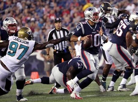 Foxborough, MA - 8/10/2017 - (1st half) - New England Patriots quarterback Jimmy Garoppolo (10) scrambles while under pressure during the first half. The New England Patriots host the Jacksonville Jaguars in a preseason exhibition game at Gillette stadium in Foxborough, MA. - (Barry Chin/Globe Staff), Section: Sports, Reporter: Ben Volin, Topic: 11Patriots-Jaguars, LOID: 8.3.3364713571.
