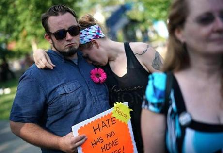 Krystin Rines rested her head on husband Tyler?s shoulder during a vigil Saturday in Charlottesville, Va.
