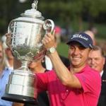 CHARLOTTE, NC - AUGUST 13: Justin Thomas of the United States poses with the Wanamaker Trophy after winning the 2017 PGA Championship during the final round at Quail Hollow Club on August 13, 2017 in Charlotte, North Carolina. Thomas finished with an -8. (Photo by Sam Greenwood/Getty Images)