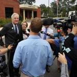 Senator Luther Strange spoke to the media after voting with his wife, Melissa, in Homewood, Ala. 