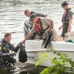 First responders searched for the body of a teen girl killed in a jet ski accident on the Merrimack River off the Wotton Street boat ramp in Chelmsford on Monday.