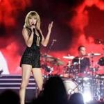 (FILES) This file photo taken on October 21, 2016 shows singer-songwriter Taylor Swift performing her only full concert of 2016 during the Formula 1 United States Grand Prix at Circuit of The Americas in Austin, Texas. Taylor Swift's former bodyguard told how he witnessed the pop star's skirt being flipped up before she was then groped by a DJ as he gave evidence in a US courtroom on August 11, 2017. Greg Dent told a jury in Denver, Colorado, that Swift was 