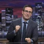 FILE - This file image provided by HBO shows John Oliver on the set of 