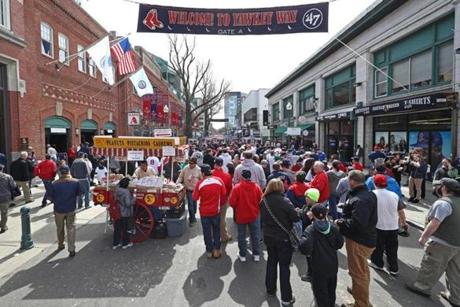 BOSTON, MA - APRIL 3: Fans walk down Yawkey Way before the opening day game between the Boston Red Sox and the Pittsburgh Pirates at Fenway Park on April 3, 2017 in Boston, Massachusetts. (Photo by Maddie Meyer/Getty Images)
