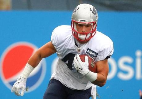 Foxborough-8/08/17- The Patriots held their trainiing camp Tuesday at Gillette Stadium practice fields with the Jacksonville Jaguars. Jacob Hollister carries the ball in a drill. John Tlumacki/Globe Staff(sports)
