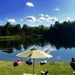 Copper Pond is the spot to swim, kayak, or fish at Twin Farms resort in Vermont.
