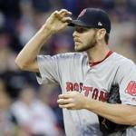 Boston Red Sox starting pitcher Chris Sale adjusts his cap in the second inning of a baseball game against the Cleveland Indians, Thursday, Aug. 24, 2017, in Cleveland. (AP Photo/Tony Dejak)