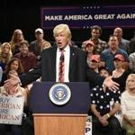 Alec Baldwin performs his impression of President Donald Trump on the set of 