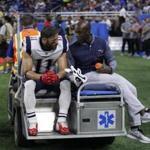 New England Patriots wide receiver Julian Edelman (11) is taken off the field on a cart during the first half of an NFL preseason football game against the Detroit Lions, Friday, Aug. 25, 2017, in Detroit. (AP Photo/Duane Burleson)