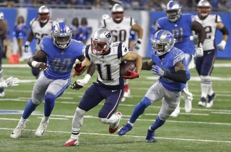 New England Patriots wide receiver Julian Edelman (11) breaks downfield as Detroit Lions linebacker Jarrad Davis (40) and cornerback Darius Slay (23) give chase during the first half of an NFL preseason football game, Friday, Aug. 25, 2017, in Detroit. (AP Photo/Carlos Osorio)
