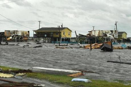 Flooded houses after Hurricane Harvey hit Rockport, Texas on August 26, 2017. / AFP PHOTO / MARK RALSTONMARK RALSTON/AFP/Getty Images
