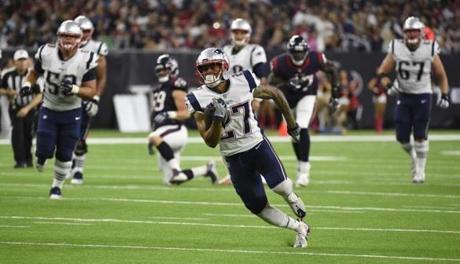 New England Patriots running back D.J. Foster (27) runs for a touchdown during the second half of an NFL football preseason game against the Houston Texans on Saturday, Aug. 19, 2017, in Houston. (AP Photo/

