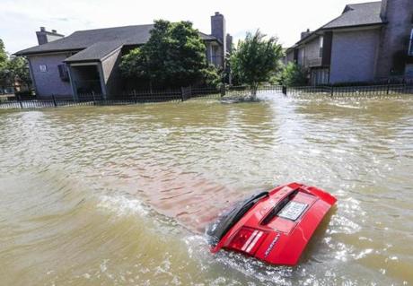 A submerged car was seen in Houston Wednesday. 

