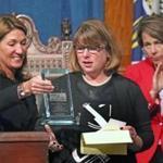 Lt. Governor Karyn Polito, left, handed Margaret Dancy the Sweeney Award for Civilian Bravery in honor of her son Jaydon Dancy.  The 10-year-old helped in a water rescue but died later in an unrelated accident. 