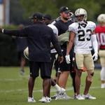 New Orleans Saints cornerback Marshon Lattimore (23) talks with coaching staff during a joint practice with the Houston Texans at the Saints NFL football training facility in Metairie, La., Thursday, Aug. 24, 2017. (AP Photo/Gerald Herbert)
