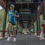 Wang Le on Friday trained at Longtanhu Park in Beijing for the Beijing marathon. Wang, a Beijing running app developer, has ran Boston four times.