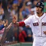 Boston, MA: August 31, 2017: The Red Sox Mookie Betts gets many hands after he scored the game tying run in the bottom of the ninth inning.The Boston Red Sox hosted the Toronto Blue Jays in a regular season MLB baseball game at Fenway Park. (Jim Davis/Globe Staff). 