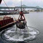 The project to dredge Boston Harbor will open the port to bigger industrial ships and allow for an increase in traffic.