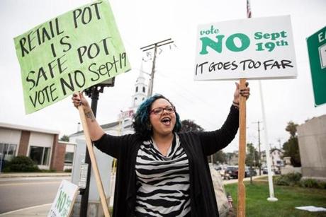 Milford, MA -- 09/16/17 -- Frankie Pinedo protests against a proposed ban on licensed cannabis companies in the town of Milford, on September 16, 2017, in Milford, Massachusetts. Milford Citizens for Fairness held a rally to remind residents to vote against the ban this Tuesday. (Kayana Szymczak for The Boston Globe)
