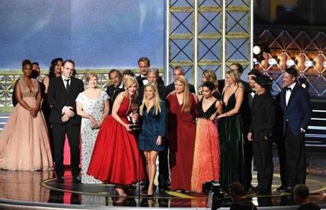LOS ANGELES, CA - SEPTEMBER 17: Actors Nicole Kidman and Reese Witherspoon (both at microphone) with cast and crew of 'Big Little Lies' accept the Outstanding Limited Series award onstage during the 69th Annual Primetime Emmy Awards at Microsoft Theater on September 17, 2017 in Los Angeles, California. (Photo by Kevin Winter/Getty Images)
