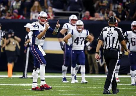 New England Patriots quarterback Tom Brady (12) calls out to an official on the field in the second half of an NFL football game against the New Orleans Saintsin New Orleans, Sunday, Sept. 17, 2017. (AP Photo/Butch Dill)

