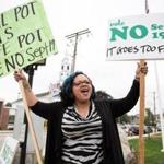 Milford, MA -- 09/16/17 -- Frankie Pinedo protests against a proposed ban on licensed cannabis companies in the town of Milford, on September 16, 2017, in Milford, Massachusetts. Milford Citizens for Fairness held a rally to remind residents to vote against the ban this Tuesday. (Kayana Szymczak for The Boston Globe)