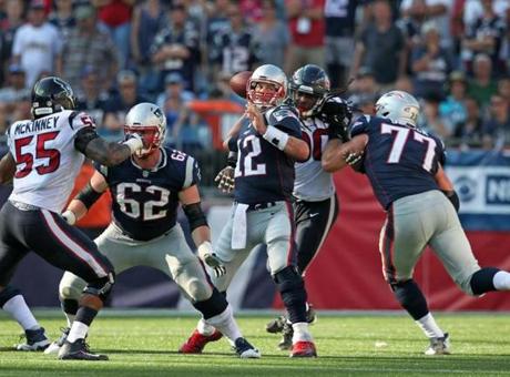 Foxborough, MA: September 24, 2017: Patriots quarterback Tom Brady fires an 18 yard pass that was caught by WR Brandin Cooks and gave New England a first and ten at the Texans 44 yard line during the game winning drive. The New England Patriots hosted the Houston Texans in a regular season NFL football game at Gillette Stadium. (Jim Davis/Globe Staff).
