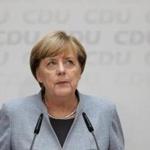 German Chancellor Angela Merkel paused during a news conference Monday in Berlin.