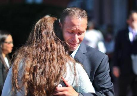 Eric Estevez, who knew Vanessa MacCormack, got emotional as he was hugged by a friend during Friday?s vigil at Revere City Hall.
