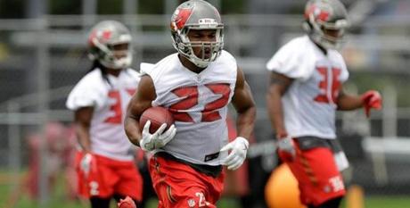 Tampa Bay Buccaneers running back Doug Martin (22) runs with the ball during NFL football minicamp Tuesday, June 13, 2017, in Tampa, Fla. (AP Photo/Chris O'Meara)
